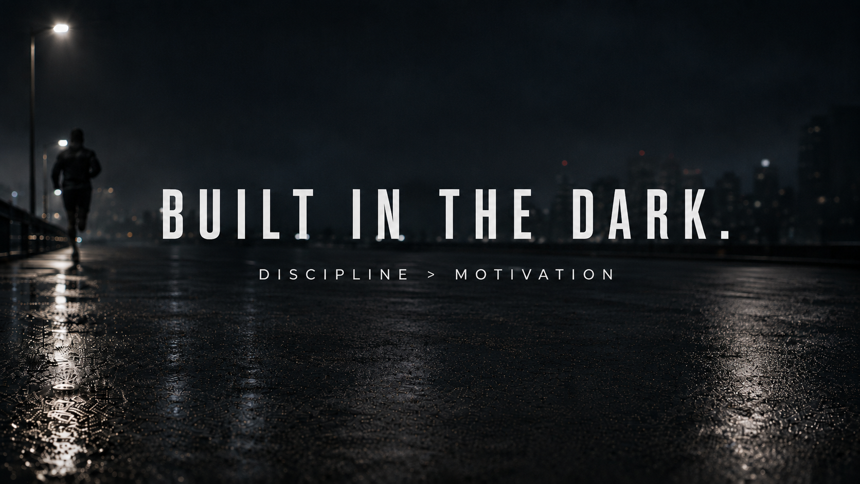 Person walking on a wet road at night with text 'Built in the Dark' and 'Discipline > Motivation'.